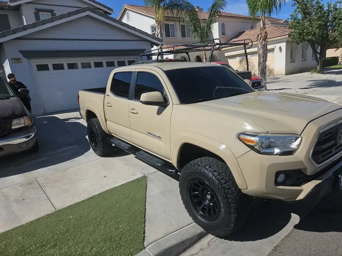 A Tacoma, worked on right at the curb