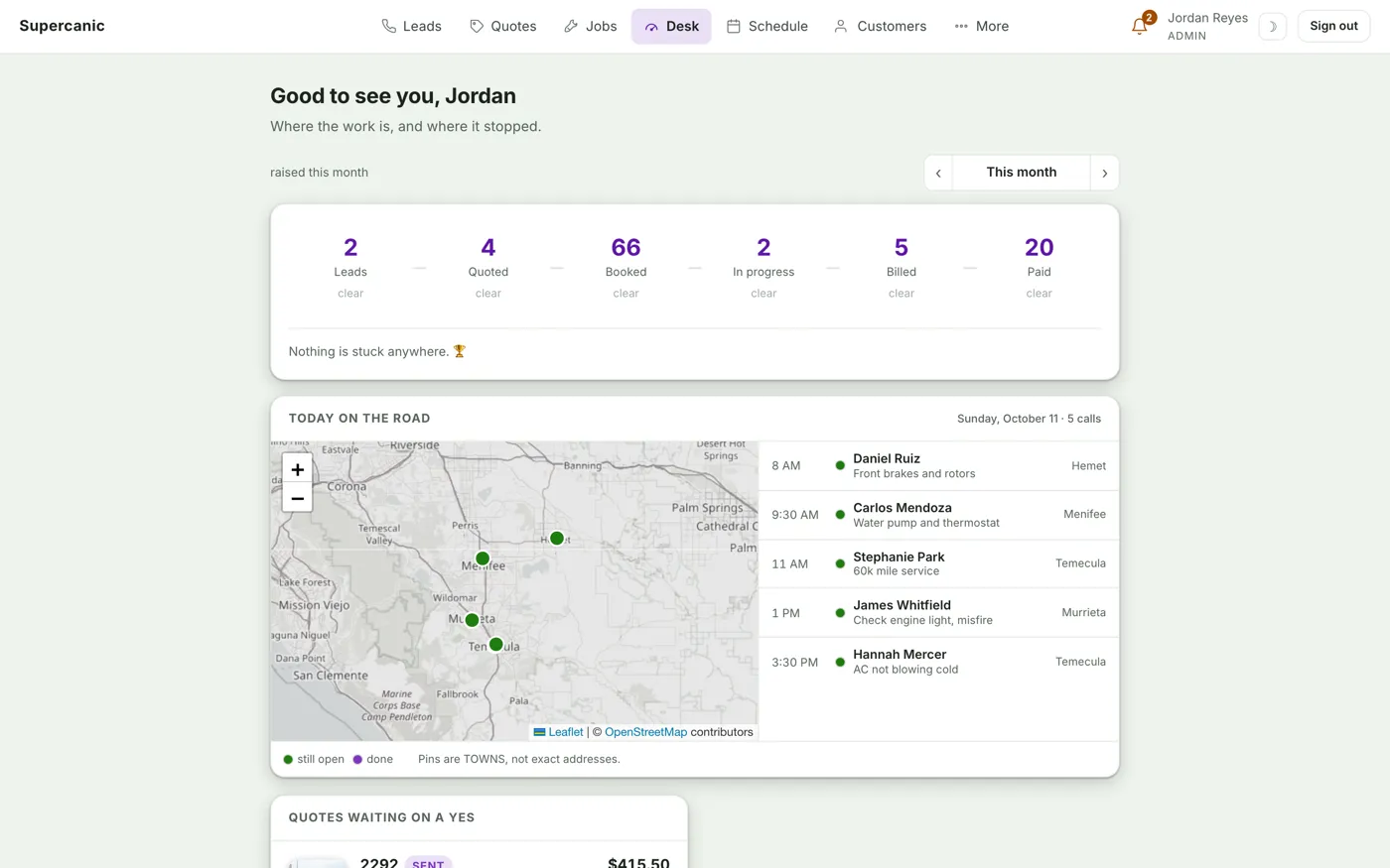 The Shop Desk desk on a laptop: job counts across the top and today's stops on a map