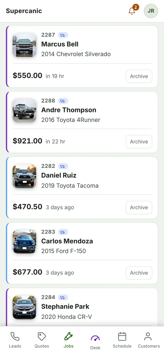 Shop Desk jobs on a phone, each job a tile with a photo of the car, the customer and the price